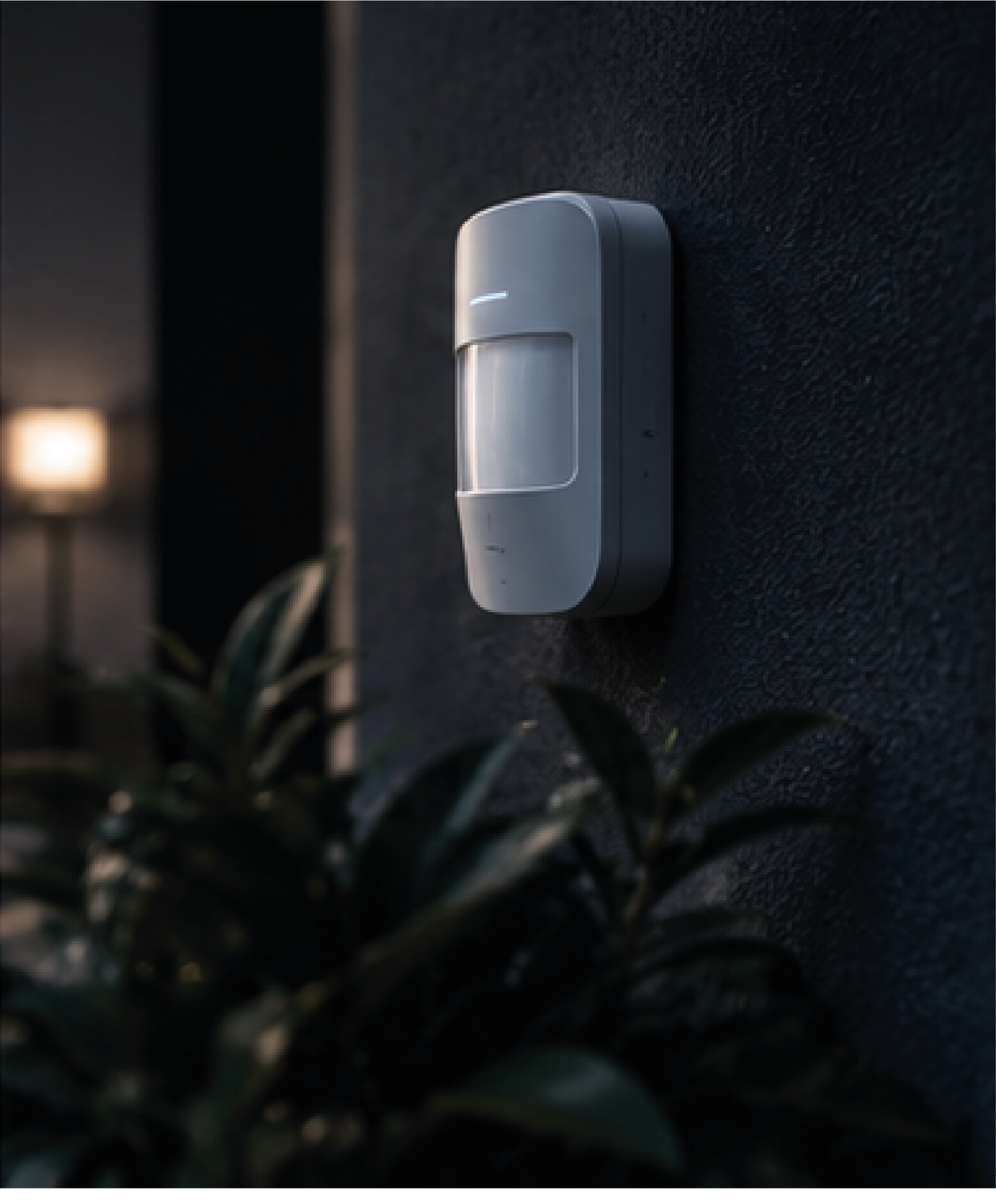 Alarm system keypad installed on an interior wall